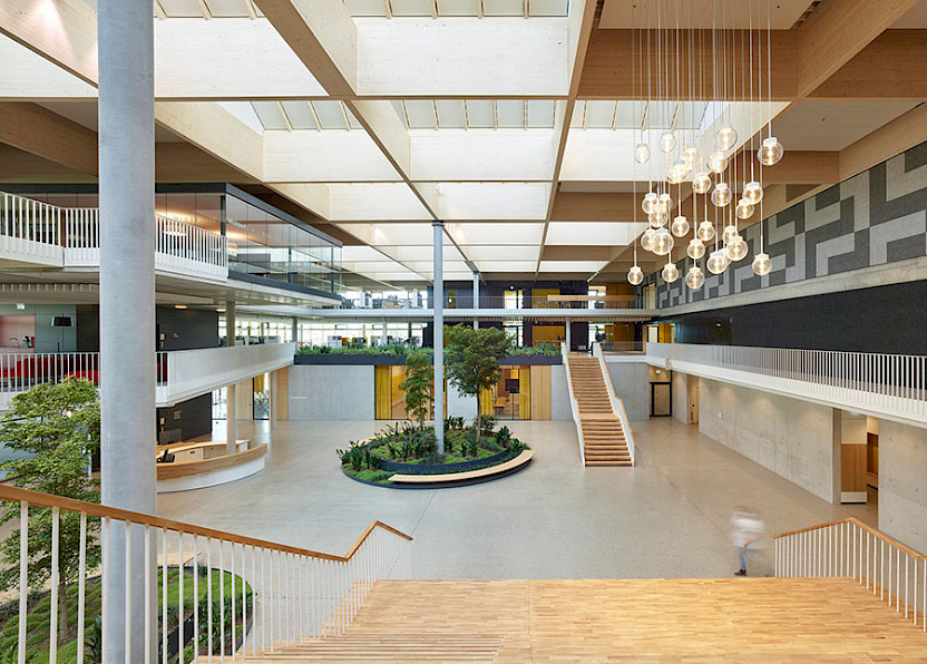 Promega Under One Roof: A large atrium welcomes employees and external visitors.